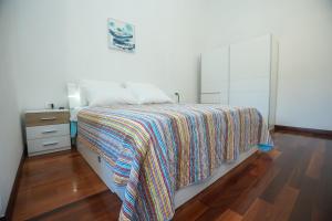 Postel nebo postele na pokoji v ubytování Apartments Seafront