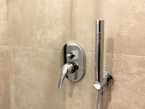 Ένα μπάνιο στο Urban Nest Rooms Red Carpet +39 φωτογραφίες