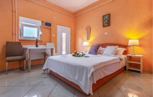 Postel nebo postele na pokoji v ubytování Studio Apartment In Medulin