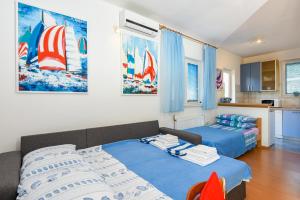 Posteľ alebo postele v izbe v ubytovaní Apartment Suhor