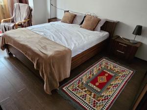 Postel nebo postele na pokoji v ubytování Garii Studio + 12 fotografií