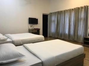 Φωτογραφία από το άλμπουμ του Western Ghats Holiday Home σε Kalpetta