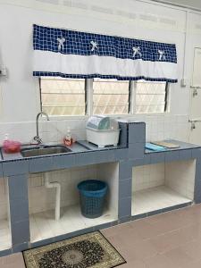 Dapur atau dapur kecil di Rose Case by Check In Host +10 foto