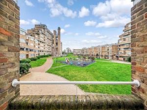 a view of a park from an apartment building at Pass the Keys Spacious Apartment in Honor Oak in London