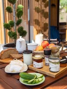 a table with bread and other food items on it at Chalet Alte Schmiede in Göstling an der Ybbs