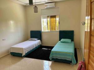 Una cama o camas en una habitación de Maison Dar Zarka 15 fotos más