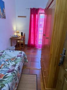 Postel nebo postele na pokoji v ubytování Guest House Casa Tacoronte