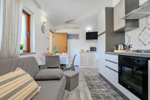 Η κουζίνα ή μικρή κουζίνα στο Residenza la perla