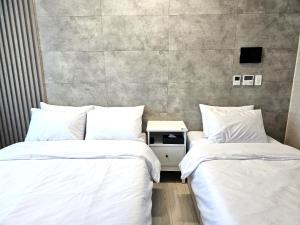 Postel nebo postele na pokoji v ubytování 라비앙즈-Raviens-Elliy's Room