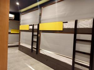 Postel nebo postele na pokoji v ubytování Stayvilla Hostel