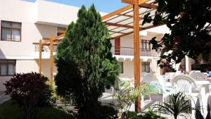 Сад в Belle Sand Hotel