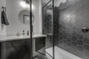 a bathroom with a shower and a sink at Studio9Forty in Atlanta