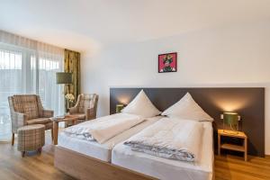 Postel nebo postele na pokoji v ubytování Haus am Krummbach