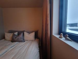 En eller flere senge i et værelse på Panorama view apartment