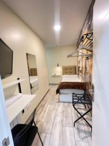 Postel nebo postele na pokoji v ubytování Hostal Oliver