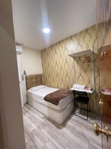 Postel nebo postele na pokoji v ubytování Hostal Oliver