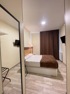 Postel nebo postele na pokoji v ubytování Hostal Oliver