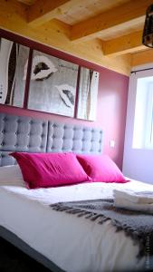 מיטה או מיטות בחדר ב-La Char'Vigne