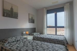 Posteľ alebo postele v izbe v ubytovaní 011 - Residencial Bahía 002 - comfortHOLIDAYS