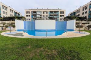 Bazén v ubytovaní 011 - Residencial Bahía 002 - comfortHOLIDAYS alebo v jeho blízkosti