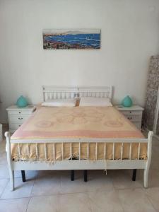 En eller flere senge i et værelse på Appartamentino Napoli Centro Storico