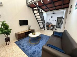 Zona d'estar a One Mama’s Guest House