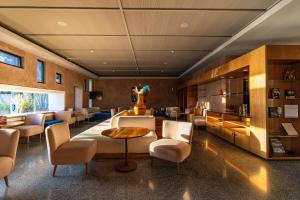 Posezení v ubytování Al Maaden Villa Hotel & Spa