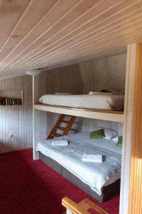 En eller flere senge i et værelse på Best Located Duplex Apartment