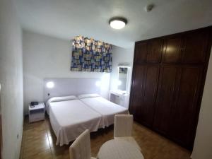 Cama o camas de una habitación en Hotel Casa del Sol