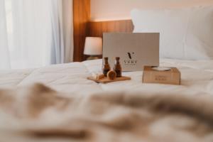 מיטה או מיטות בחדר ב-Vert Hotel Penedo
