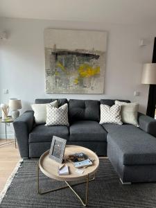 a living room with a couch and a coffee table at Top Balea in Pontevedra