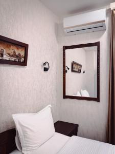 Postel nebo postele na pokoji v ubytování Aspar Boutique Hotel