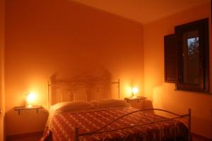 Postel nebo postele na pokoji v ubytování B&B del Castagneto