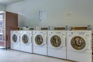 a row of washers and dryers in a laundrette at Village Square in Copper Mountain