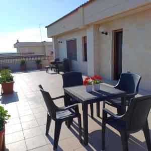 A balcony or terrace at NSM Casa di Fulmine attico con box privato