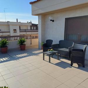A balcony or terrace at NSM Casa di Fulmine attico con box privato