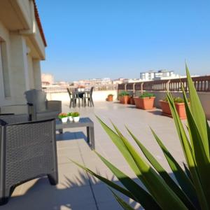 A balcony or terrace at NSM Casa di Fulmine attico con box privato