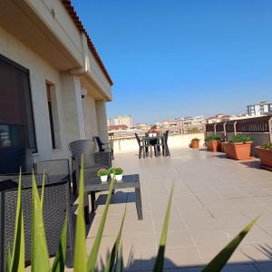 A balcony or terrace at NSM Casa di Fulmine attico con box privato
