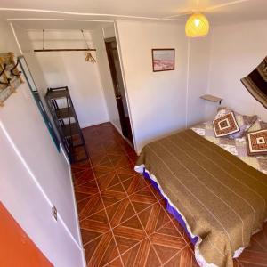 Una cama o camas en una habitación de Posada Atacameña
