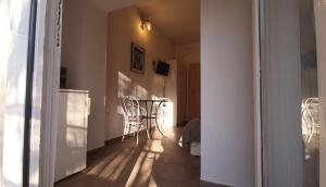 Postel nebo postele na pokoji v ubytování Pensili Apartmanház Balatonfüred