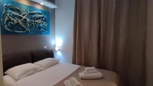 Postel nebo postele na pokoji v ubytování Vatican City San Peter quiet and lovely apartment