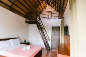 Ένα ή περισσότερα κρεβάτια σε δωμάτιο στο Asian Vanda Villas +8 φωτογραφίες