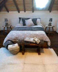 A bed or beds in a room at Chimborazo Rey lodge hotel