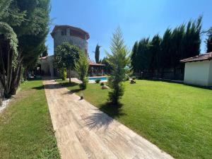 Afbeelding uit fotogalerij van Villa Oasis Taşın Zarafeti,Modern Rahatlık in Dalaman