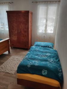 Postel nebo postele na pokoji v ubytování Alfapartmány