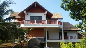 a house with a balcony on the side of it at Viewpoint Residence 2 Bedroom Villa in Koh Samui 
