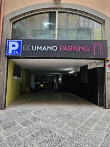 an entrance to an entrance to a parking garage at Suite SANTA CHIARA in Naples