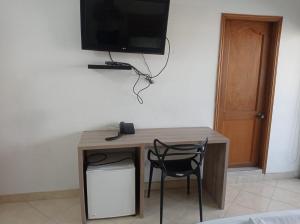 TV a/nebo společenská místnost v ubytování Hotel Damys