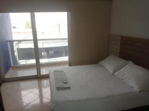 Postel nebo postele na pokoji v ubytování Hotel Damys