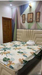 Łóżko lub łóżka w pokoju w obiekcie Urbanaid Uniworld